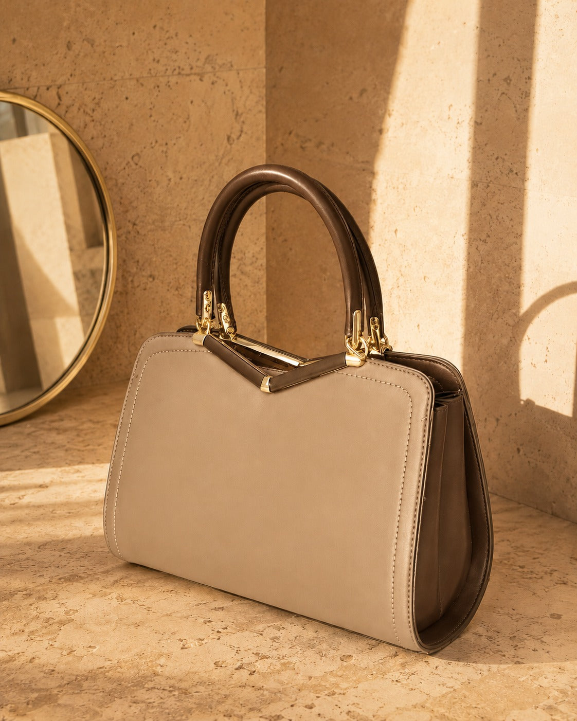 The Promenade Taupe — Frame Top Handle Bag